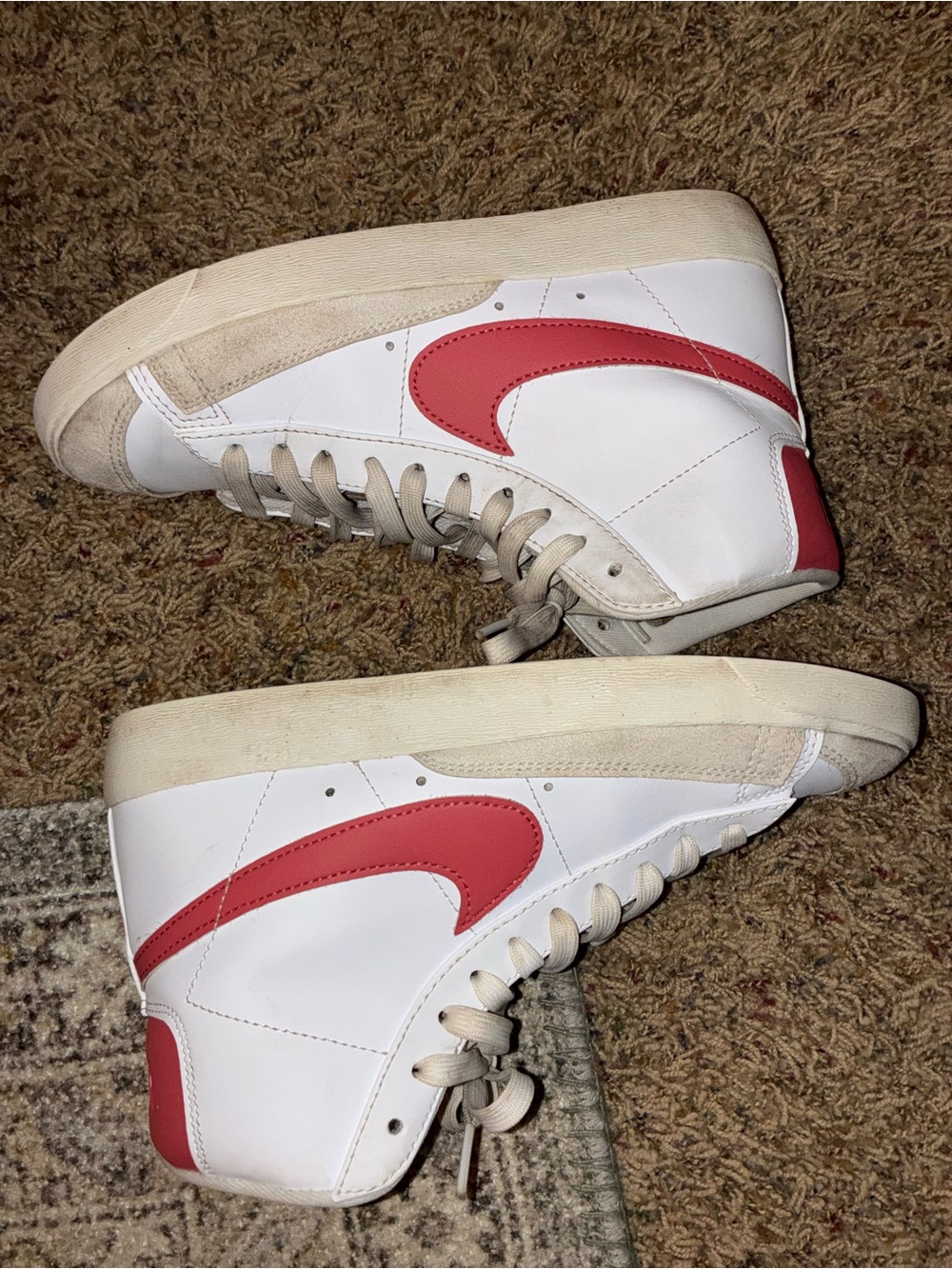 Nike Women's White High-Top Sneakers with Red Swoosh